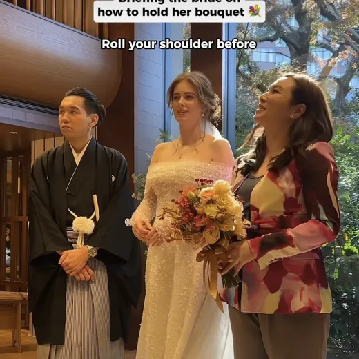 Jenny Chiu briefing the bride during a wedding ceremony in Tokyo